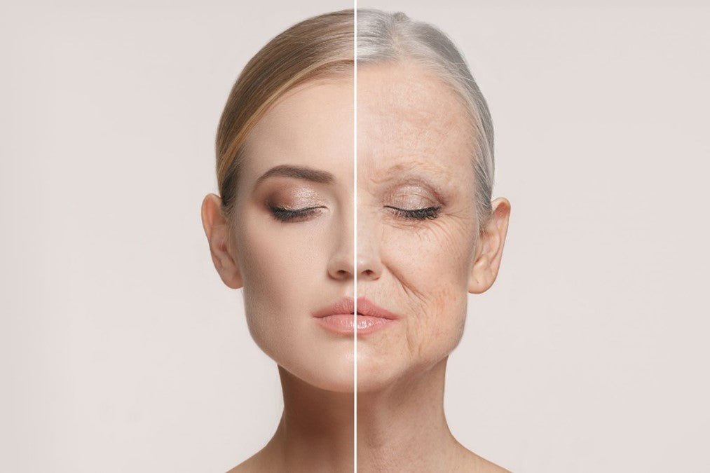 Woman examining aging skin showing loss of elasticity and volume with age